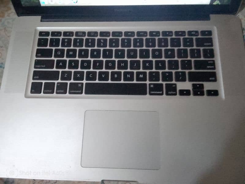 A beautiful MacBook pro for sale 10 by 10 condition 15