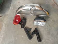 4 items headlight + bracklight  + madgard + 125 (Kan)