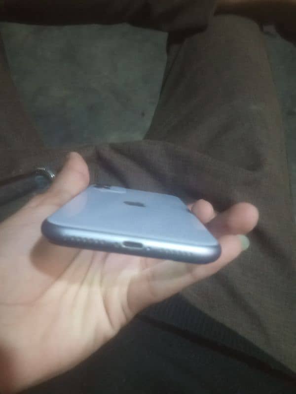 I phone 11.64gb    purple clour. 10by 10 condition no strach 9