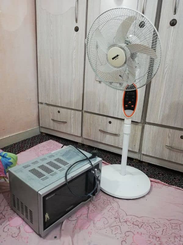 dawlance microwave And Sogo portable fan urgent sale 03333O23325 0