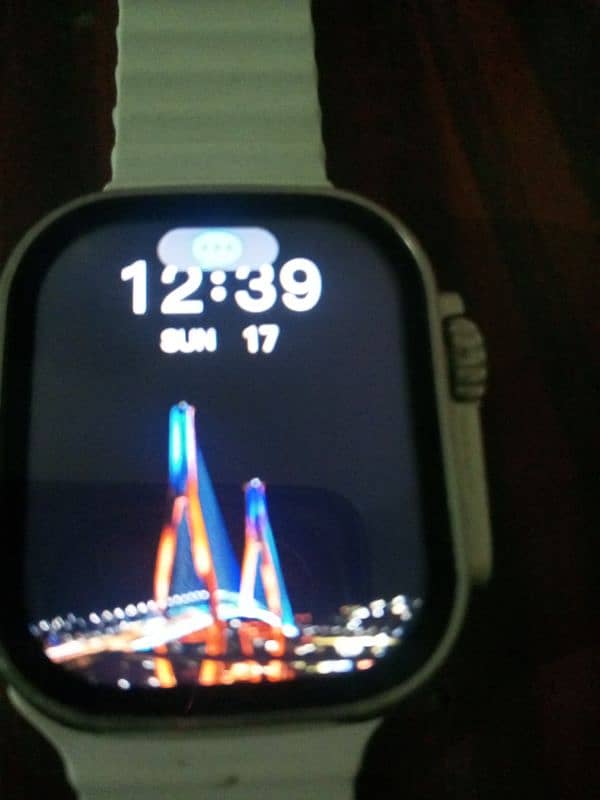 T900 ultra smart watch with three straps. 1