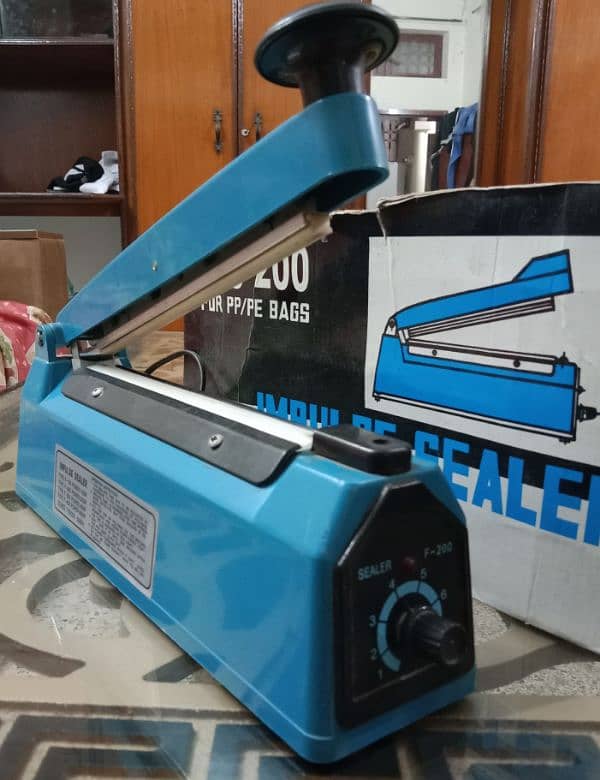 8'' hand impulse sealing machine PFS-200 for PP/PE bags 1