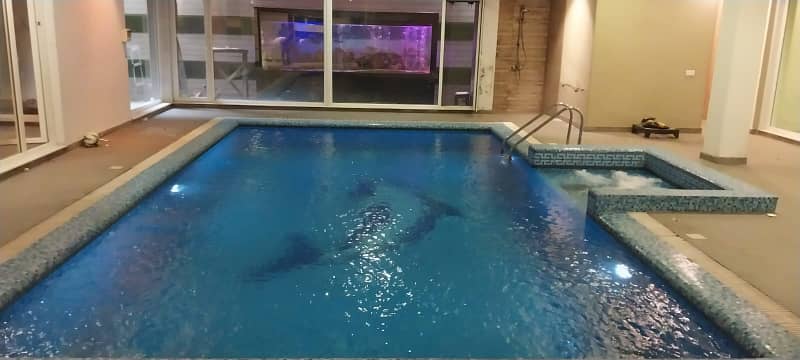 D H A Lahore 2 Kanal Mazher Munir Design House Full Basement And Swimming With 100% Original Pics Available For Rent 48