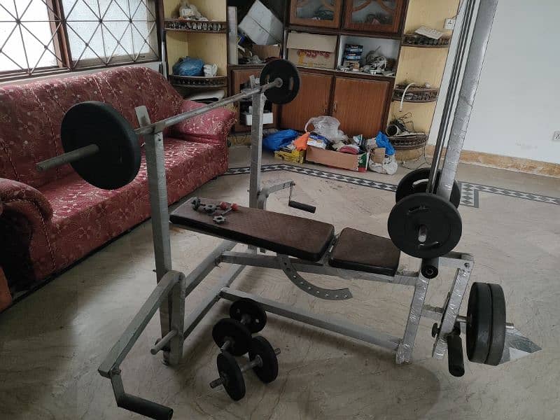 home gym equipment weight plates and bench press 2