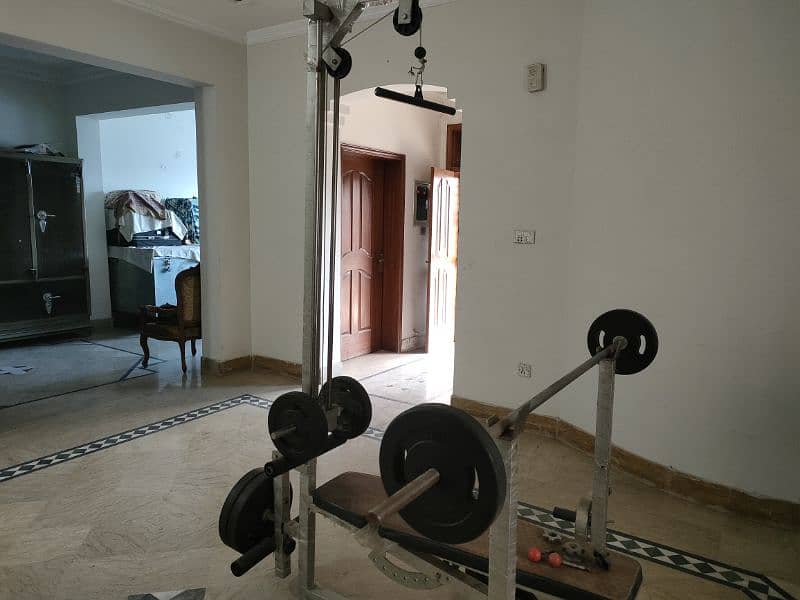 home gym equipment weight plates and bench press 4