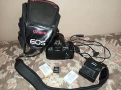 Canon EOS 700D with 28-80mm lens