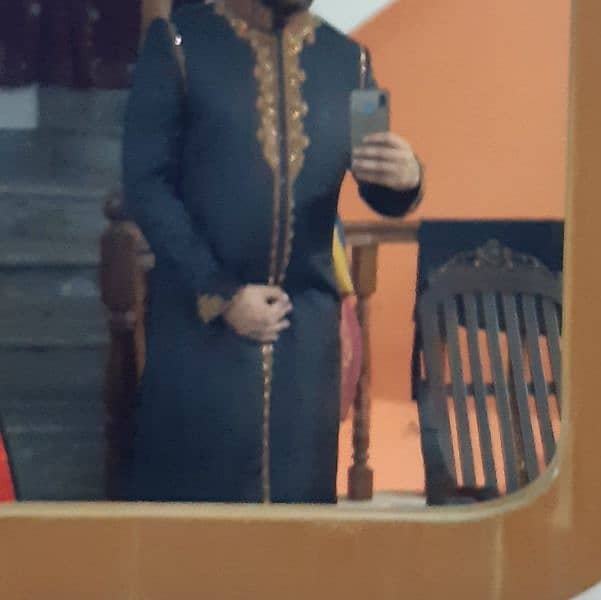 Black sherwani with karahi work 0