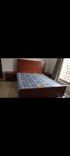 King size bed with 2 side tables in good condition