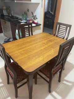 4 seater Wooden dining table for sale