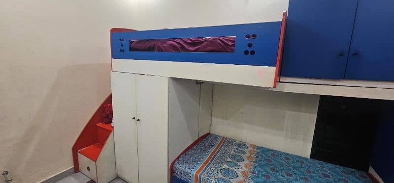 triple bunk bed with cupboards and draws 1