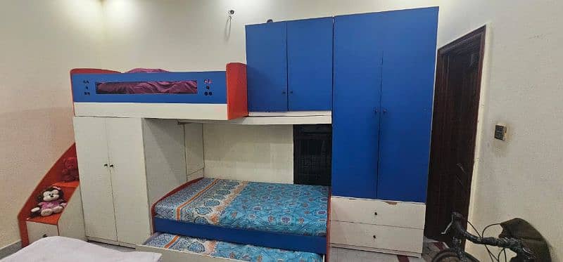 triple bunk bed with cupboards and draws 2