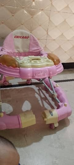 baby pink walker n rolling chair