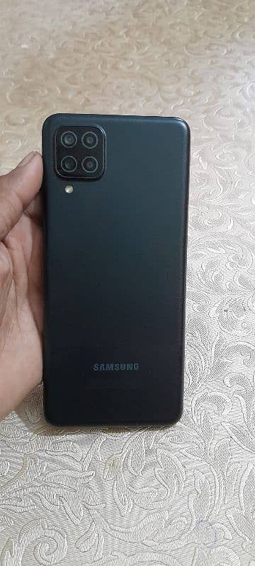 Samsung galaxy a12 condition. 10by8 5