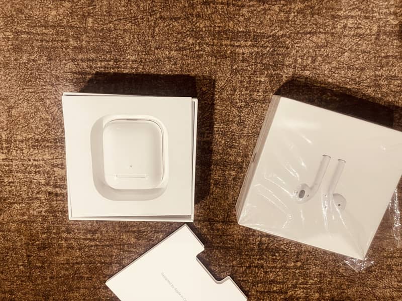 Apple Original Air Pods 2 with wireless charging case 2