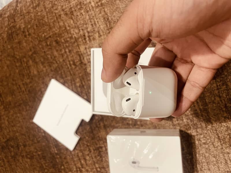 Apple Original Air Pods 2 with wireless charging case 3