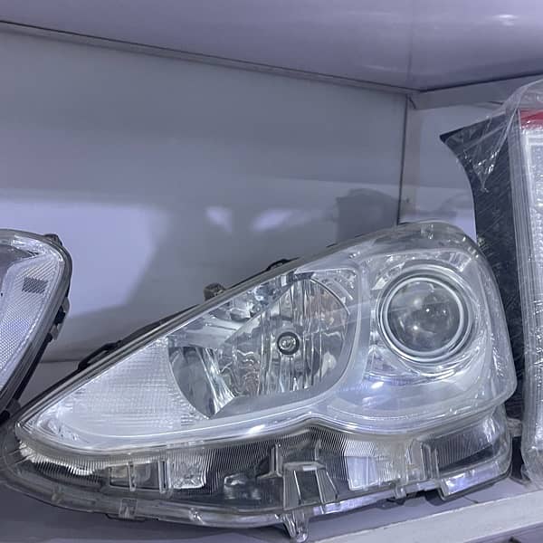 Aqua 2015 Headlight 0