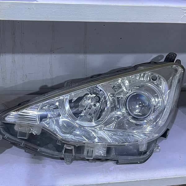 Aqua 2015 Headlight 1