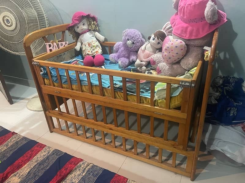 A slightly used swing cot 2