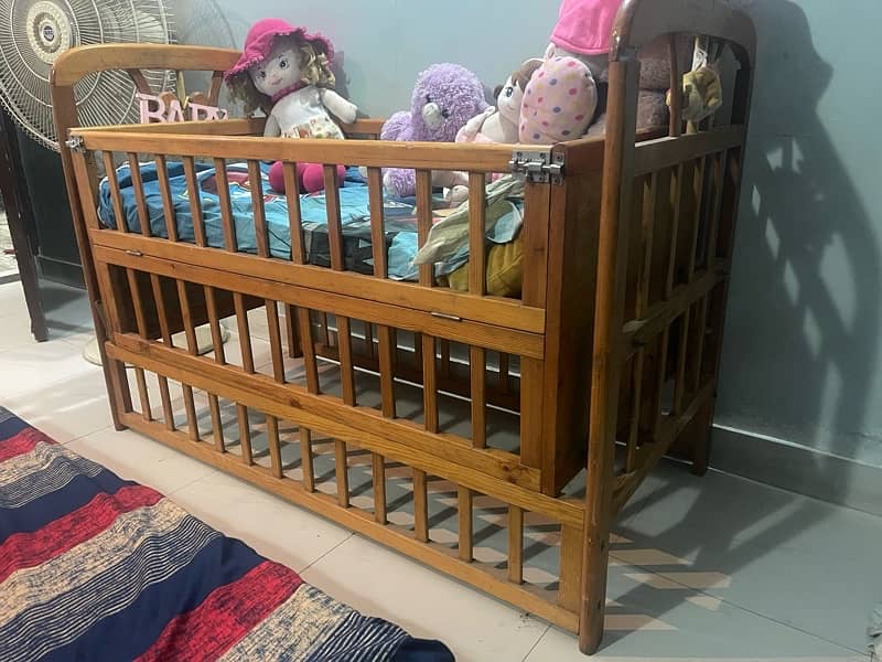 A slightly used swing cot 5