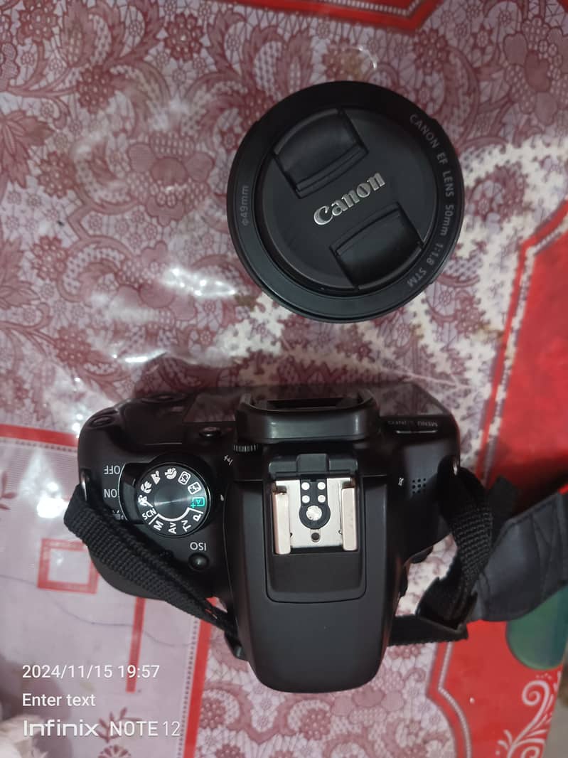 100D canon with 18-55 STM Lens 1