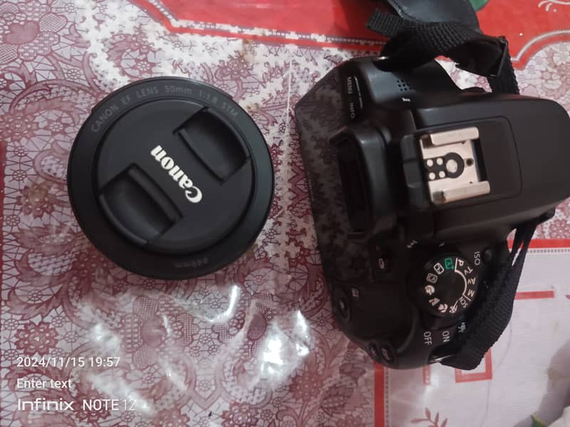 100D canon with 18-55 STM Lens 3