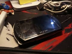 Psp go Moded/15 pre installed games