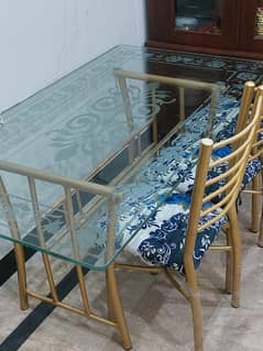 6 chair glass dining table for sale.