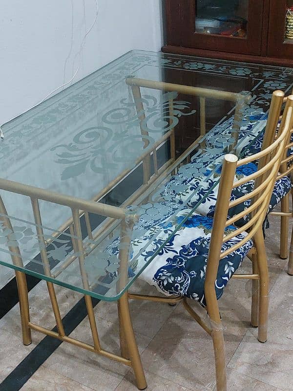 6 chair glass dining table for sale. 0