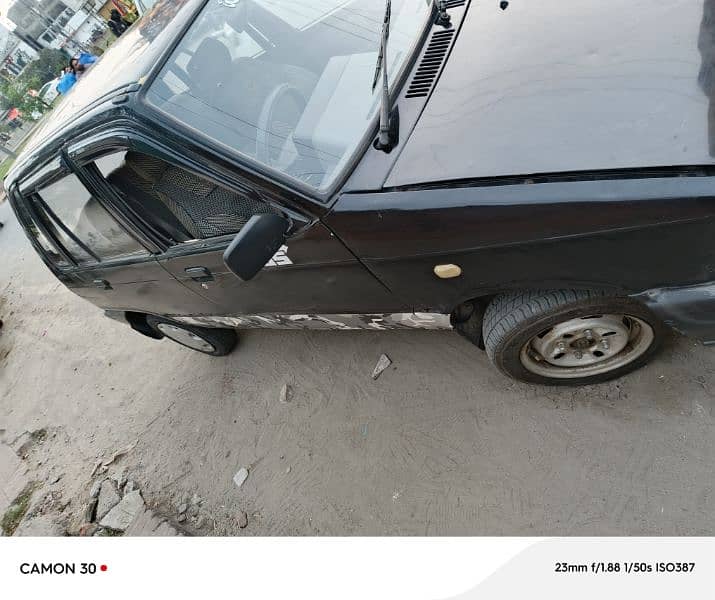 Suzuki Mehran VX 2011 almost genuine 10