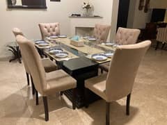 glass top dining table with 6 velvet chairs for sale