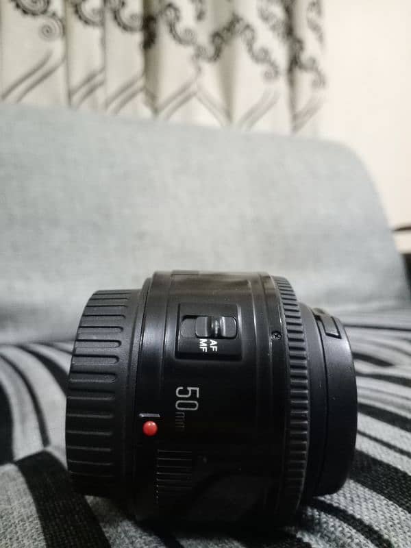 canon 1300d camera, 18,55lens , yongnou 50mm F 1.8 9