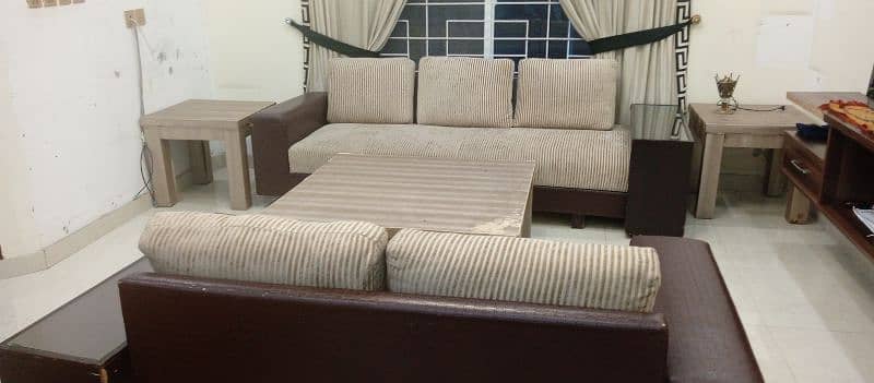 3Seateed sofa with center Table and side tables 4