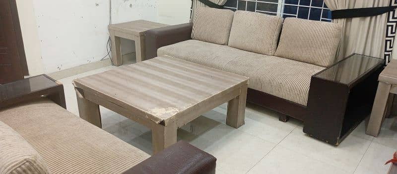 3Seateed sofa with center Table and side tables 9