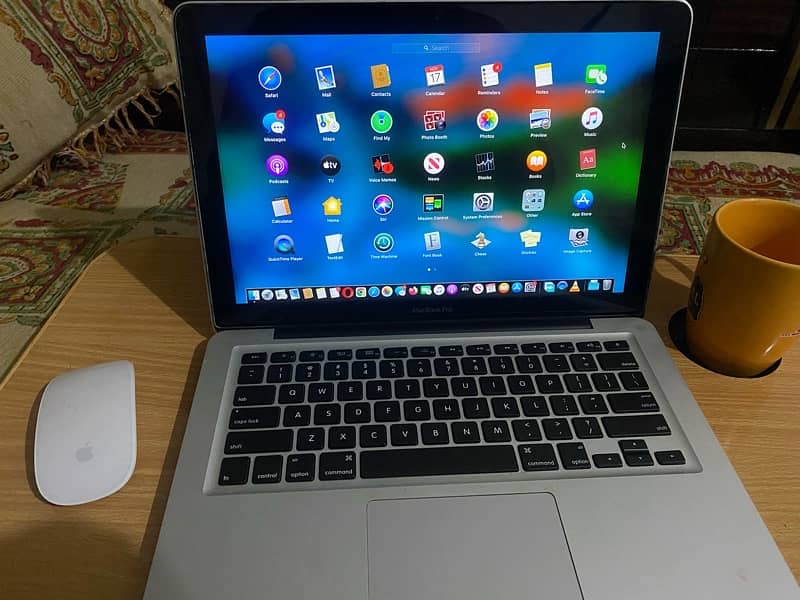 Macbook Pro 13Inch Mid 2012 8GB Ram i5 10/10 Condition Scratchless 0