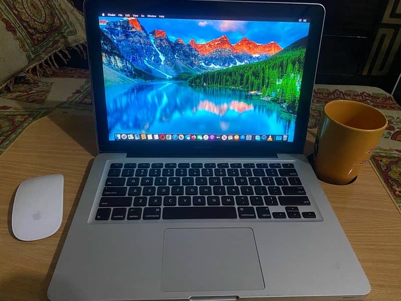 Macbook Pro 13Inch Mid 2012 8GB Ram i5 10/10 Condition Scratchless 1