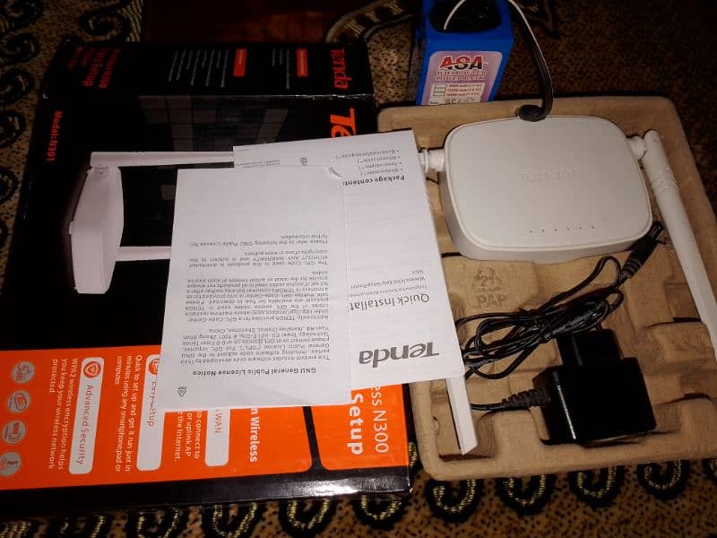 Tenda router and power bank 2