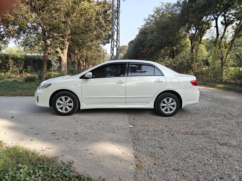 Untouch B2B Toyota Corolla XLI 2014 Islamabad registered 9