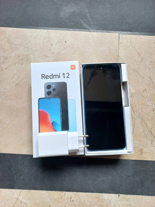 Redmi 12 8/ 128GB -with 100% genuine box and charger 10