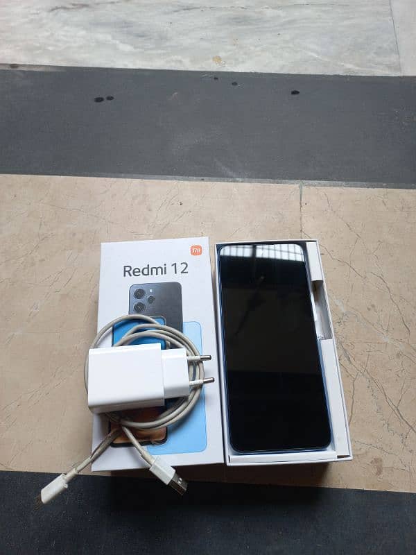 Redmi 12 8/ 128GB -with 100% genuine box and charger 11