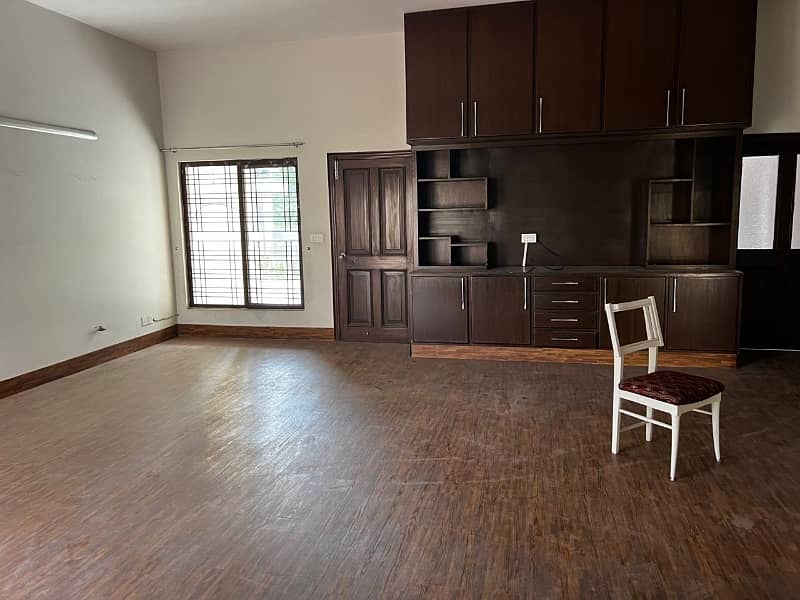 model Town One Kanal House for sale  5 bedroom with attached bathroom double tv lounge double floor double kitchen servent quarter tiles flooring and lush green lown facing park 0