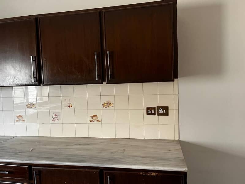 model Town One Kanal House for sale  5 bedroom with attached bathroom double tv lounge double floor double kitchen servent quarter tiles flooring and lush green lown facing park 4