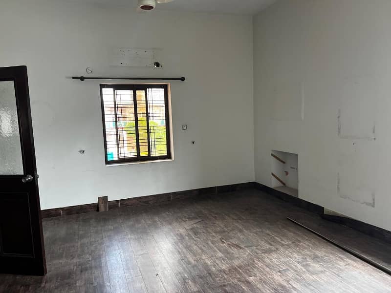 model Town One Kanal House for sale  5 bedroom with attached bathroom double tv lounge double floor double kitchen servent quarter tiles flooring and lush green lown facing park 8