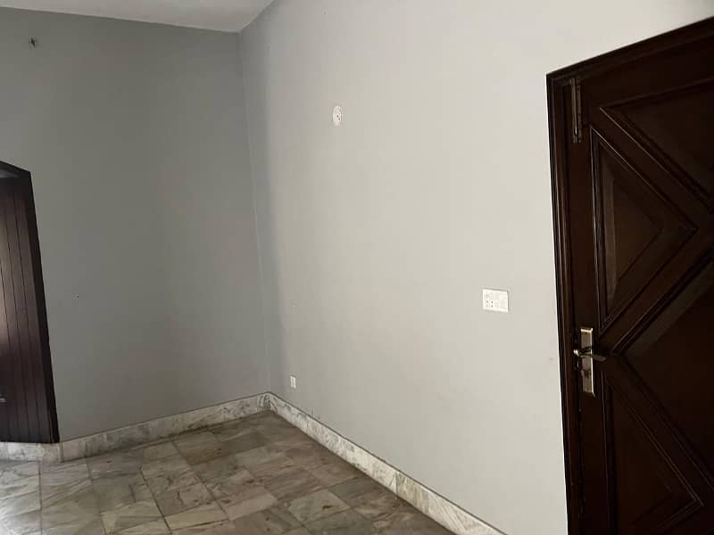 model Town One Kanal House for sale  5 bedroom with attached bathroom double tv lounge double floor double kitchen servent quarter tiles flooring and lush green lown facing park 9