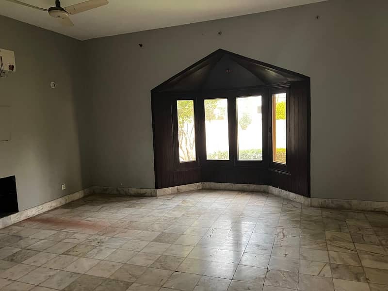 model Town One Kanal House for sale  5 bedroom with attached bathroom double tv lounge double floor double kitchen servent quarter tiles flooring and lush green lown facing park 11