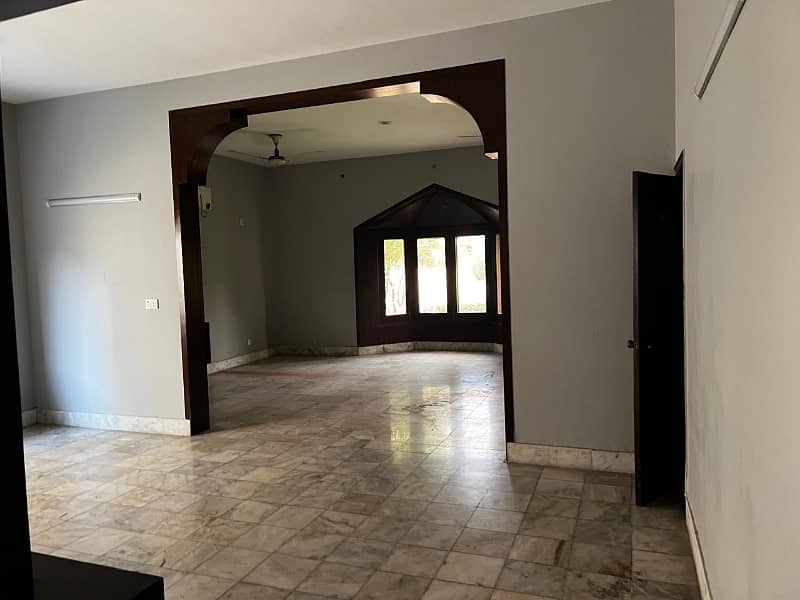 model Town One Kanal House for sale  5 bedroom with attached bathroom double tv lounge double floor double kitchen servent quarter tiles flooring and lush green lown facing park 14