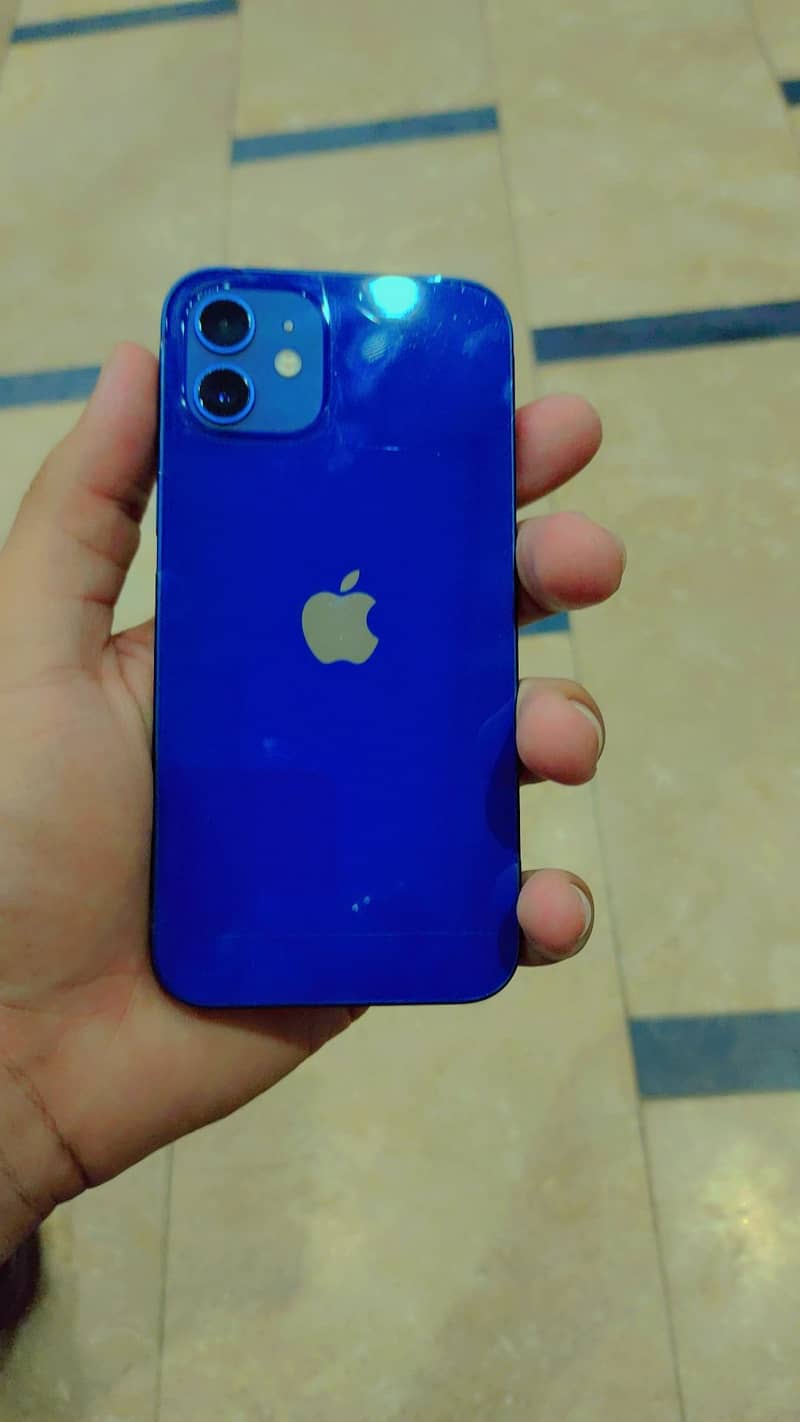 iPhone 12 non pta jv warranty m ha cute piece ha or charger bhi sath h 0