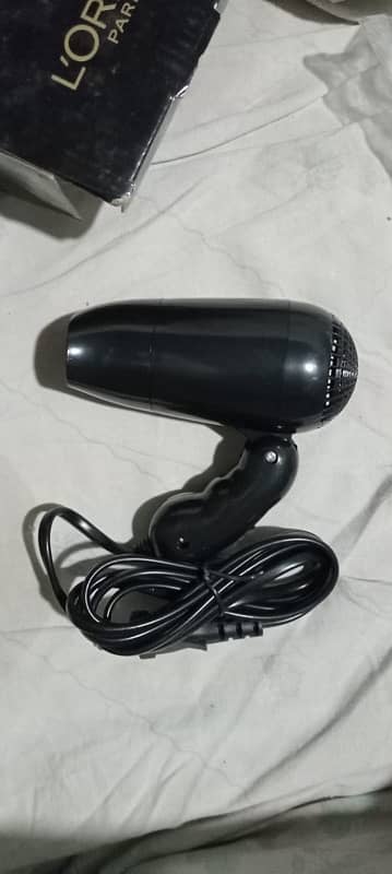 brand new loreal hair dryer . Pin packed 1