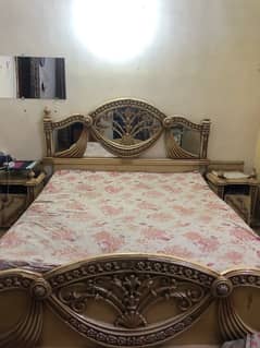 double bed with two side tables