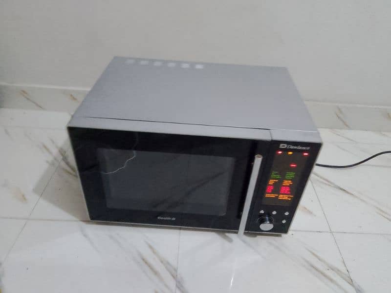 Dawlance microwave oven 2 in 1 grill microwave cooking 1