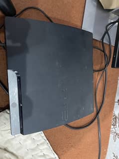 play station 3 with 11 cds and gaming handel